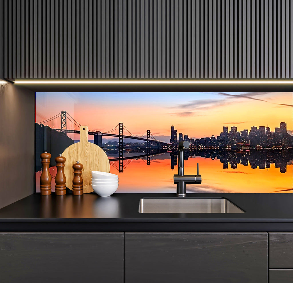 a kitchen with a picture of the bay bridge in the background