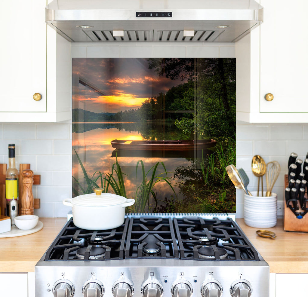 a stove top oven sitting inside of a kitchen