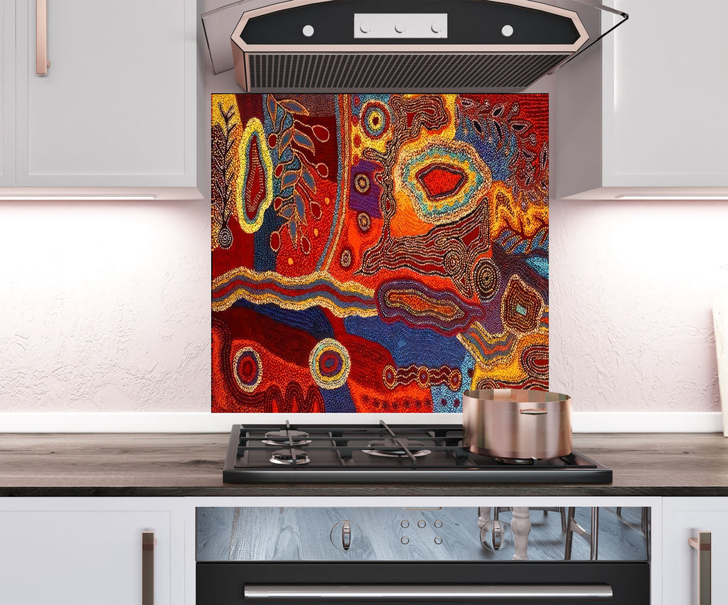 a kitchen stove with a painting on the back of it