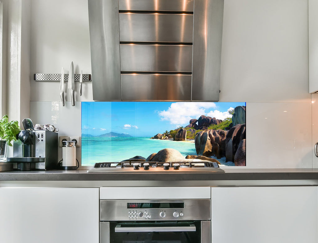 a stove top oven sitting inside of a kitchen