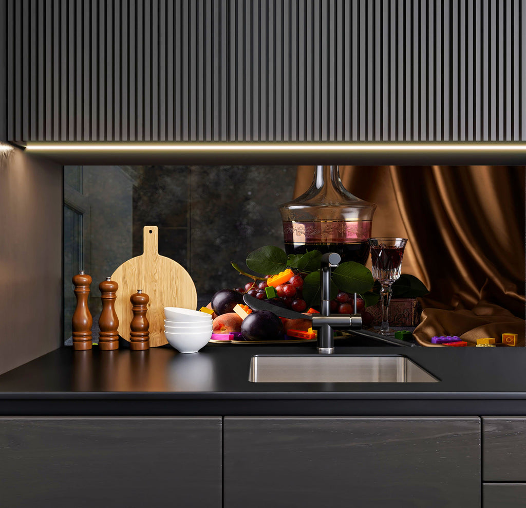 a kitchen counter with a sink and a cutting board