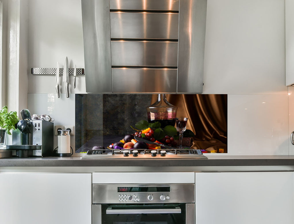 a stainless steel stove top oven sitting inside of a kitchen