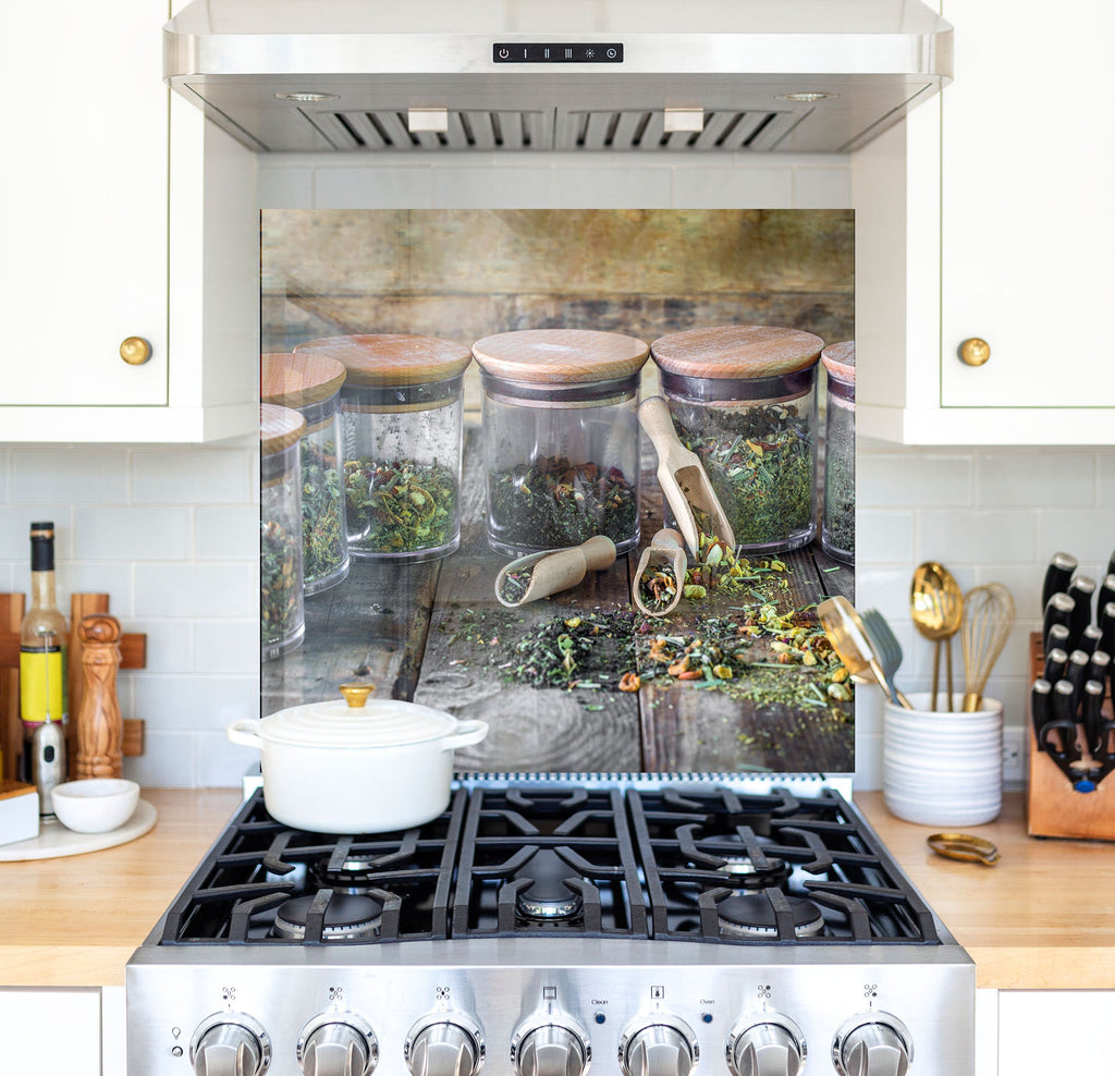 a kitchen stove with a painting of jars on it