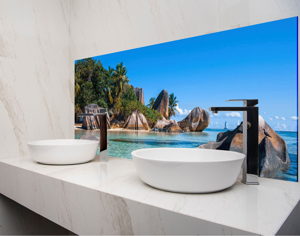 two white bowls on a counter in a bathroom