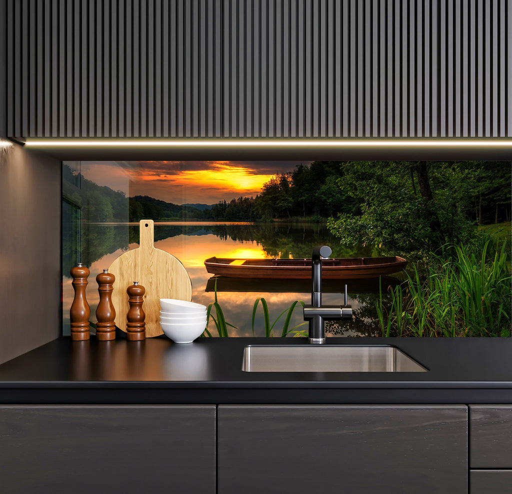 a kitchen with a sink and a painting on the wall