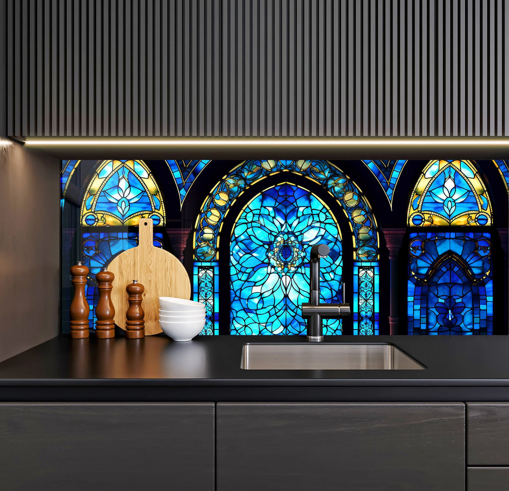 a kitchen counter with a sink and a large stained glass window