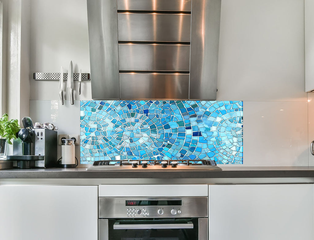 a stove top oven sitting inside of a kitchen