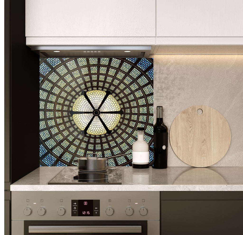 a stove top oven sitting inside of a kitchen