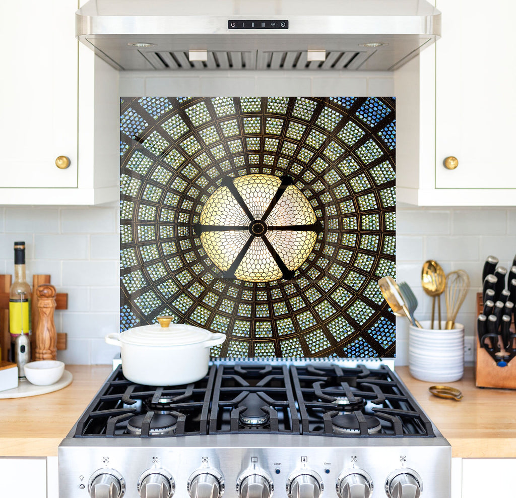 a stove top oven sitting inside of a kitchen