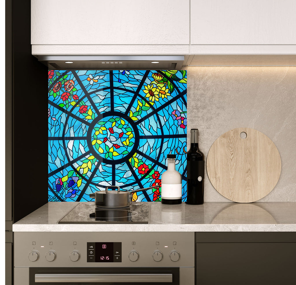 a kitchen with a stove top oven and a stained glass window