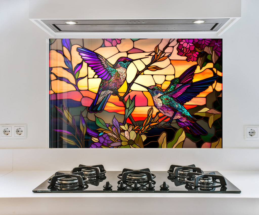 a picture of a stained glass window with a hummingbird on it