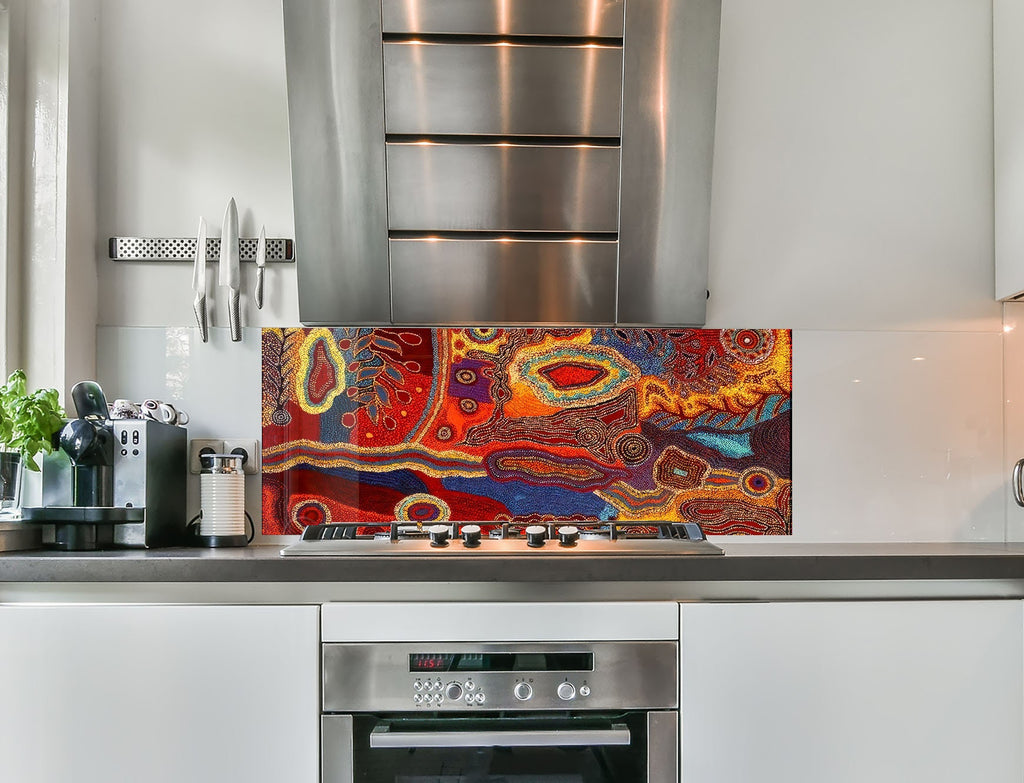 a kitchen with a stainless steel stove top oven