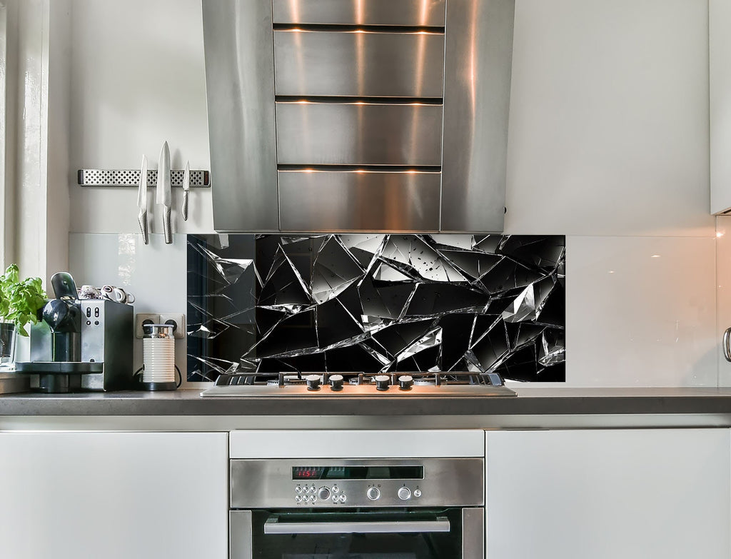 a stove top oven sitting inside of a kitchen