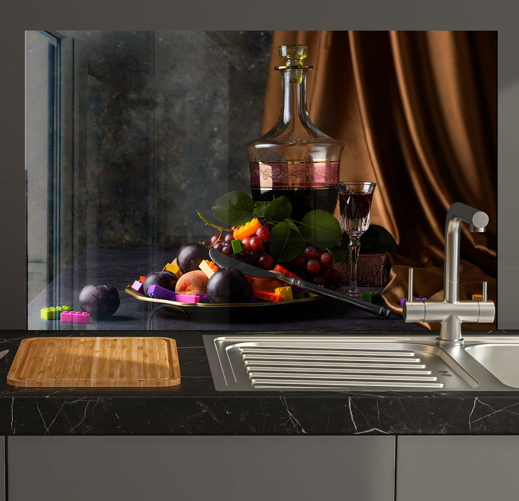 a kitchen counter with a sink and a cutting board