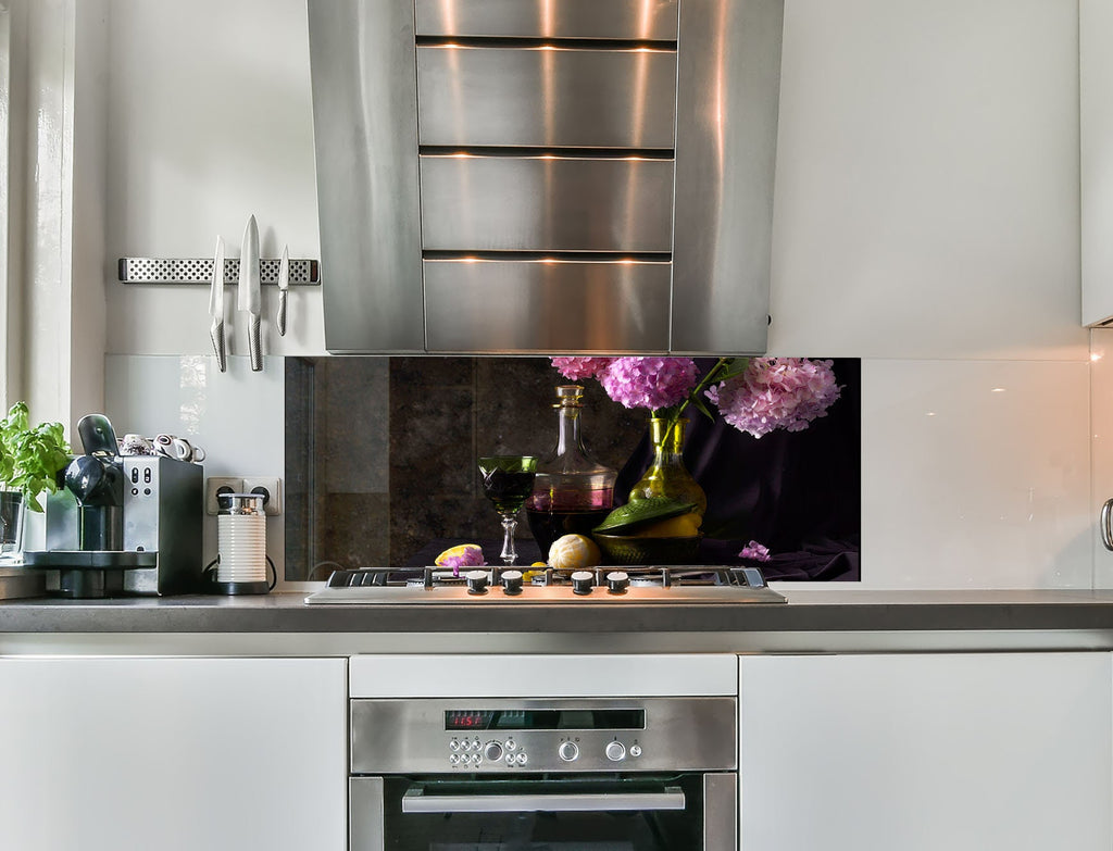 a stainless steel stove top oven sitting inside of a kitchen