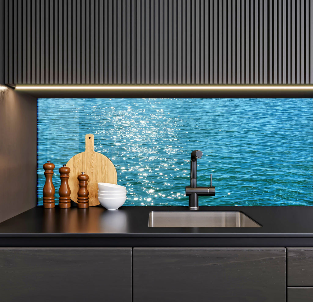 a kitchen with a sink, cutting board and cutting board on the counter