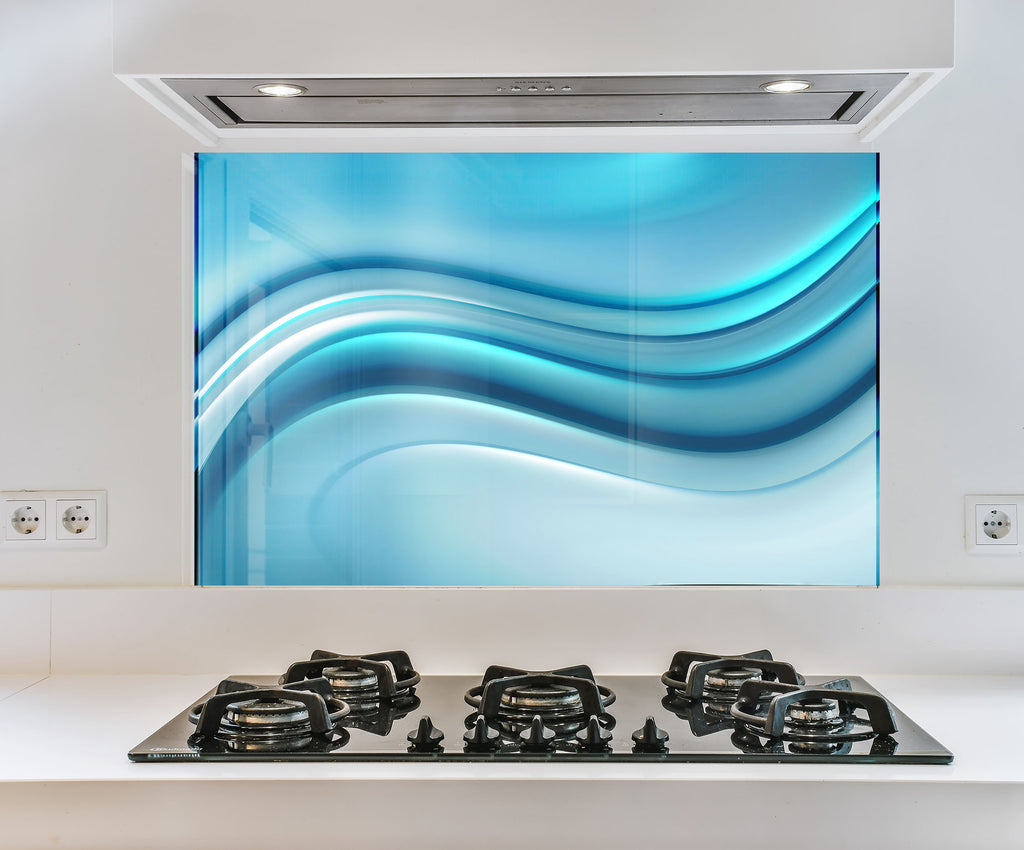 a picture of a blue wave on the wall behind a gas stove