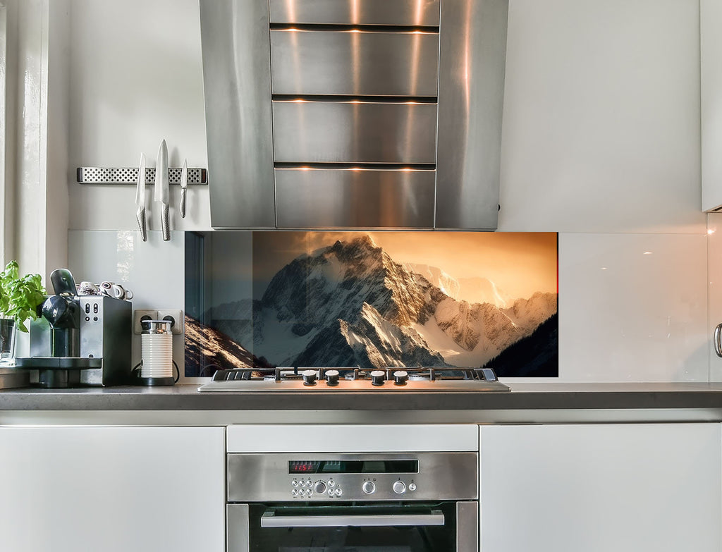 a stove top oven sitting inside of a kitchen