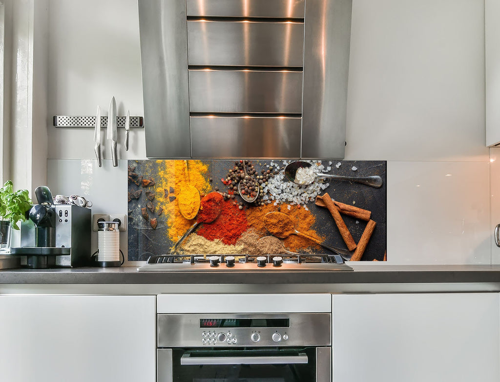 a stove top oven sitting inside of a kitchen