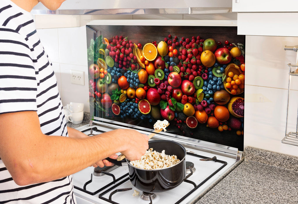 a man cooking food on top of a stove