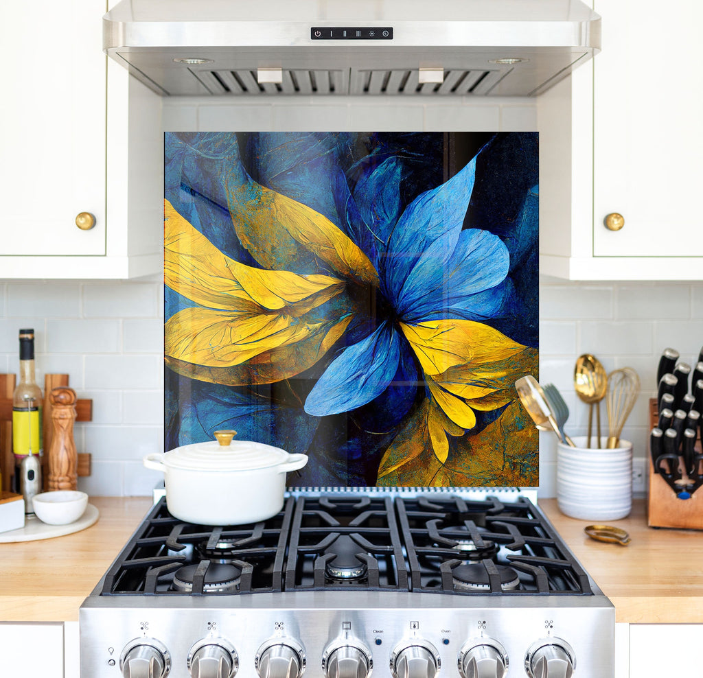 a painting of blue and yellow flowers on a wall above a stove