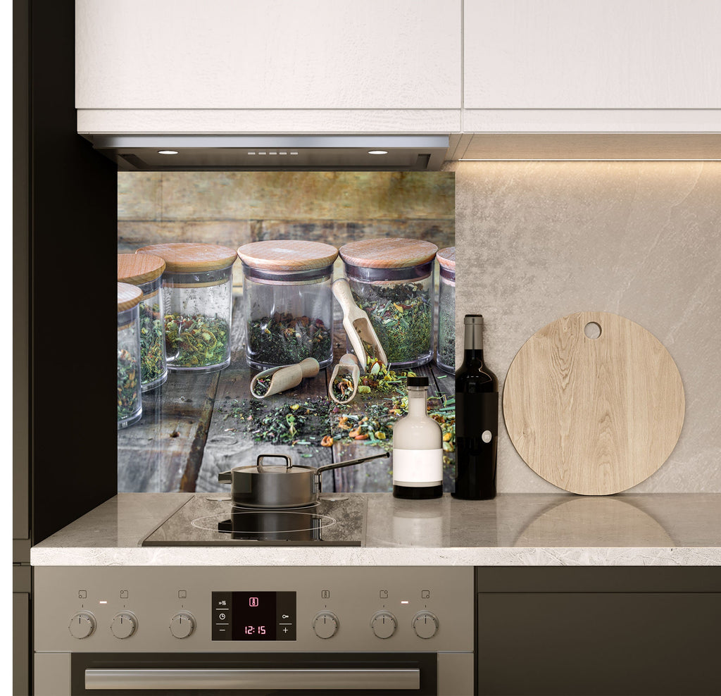 a kitchen with a stove and a wall mural