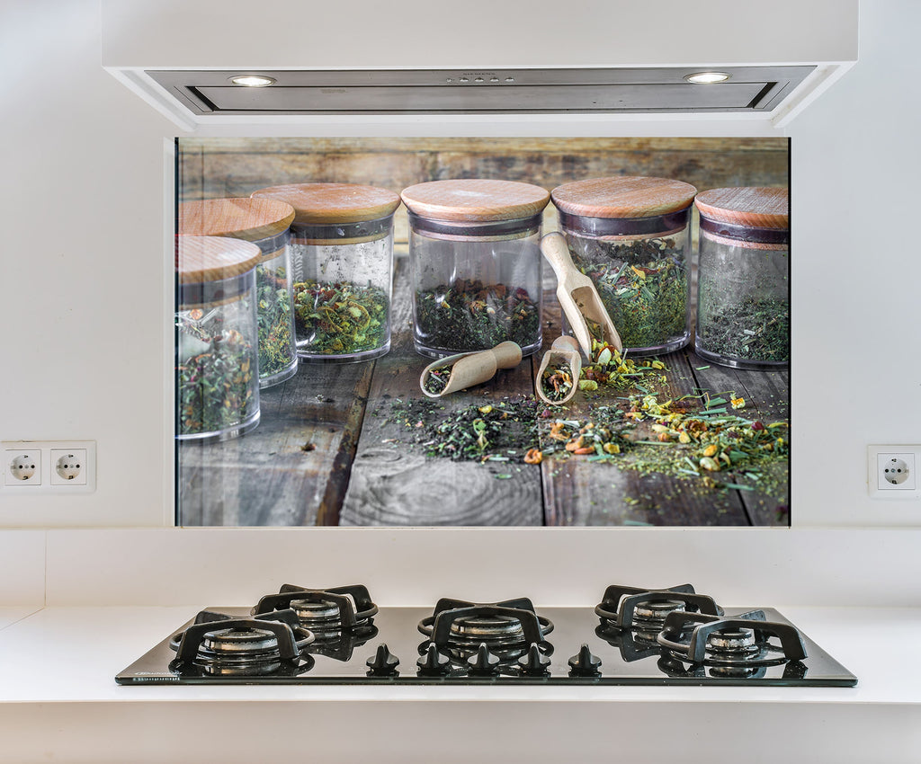 a picture of a kitchen with jars and a pair of scissors