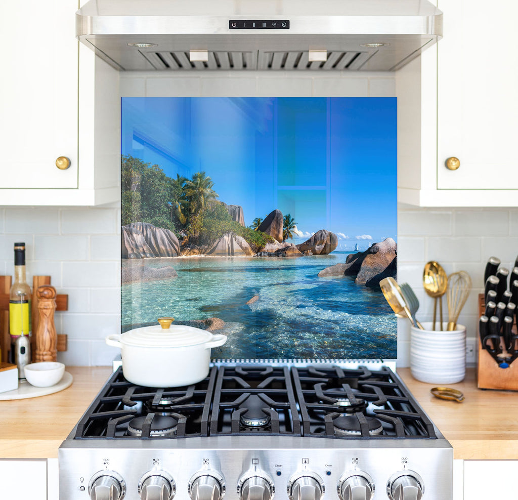 a stove top oven sitting inside of a kitchen