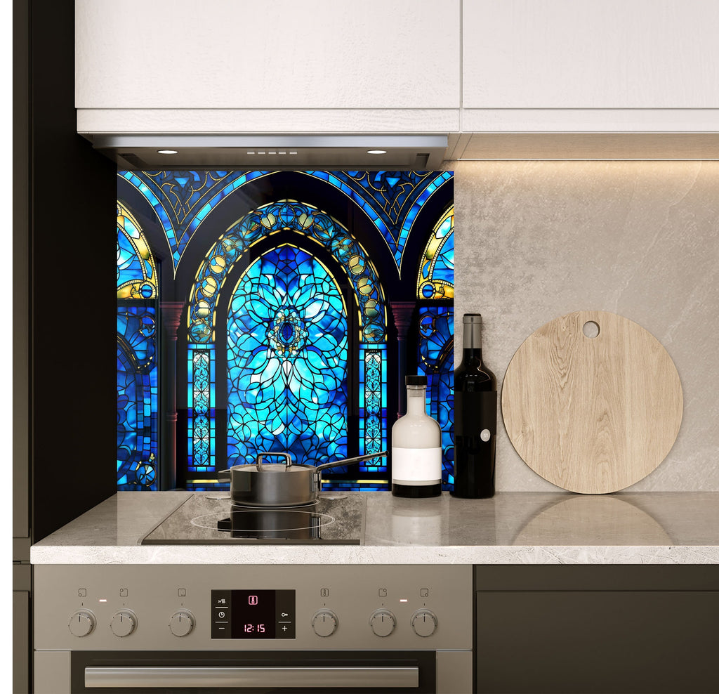 a stove top oven sitting under a stained glass window