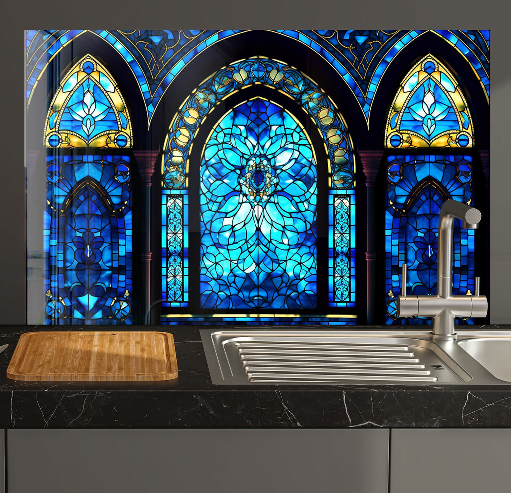 a kitchen with a sink and a large stained glass window