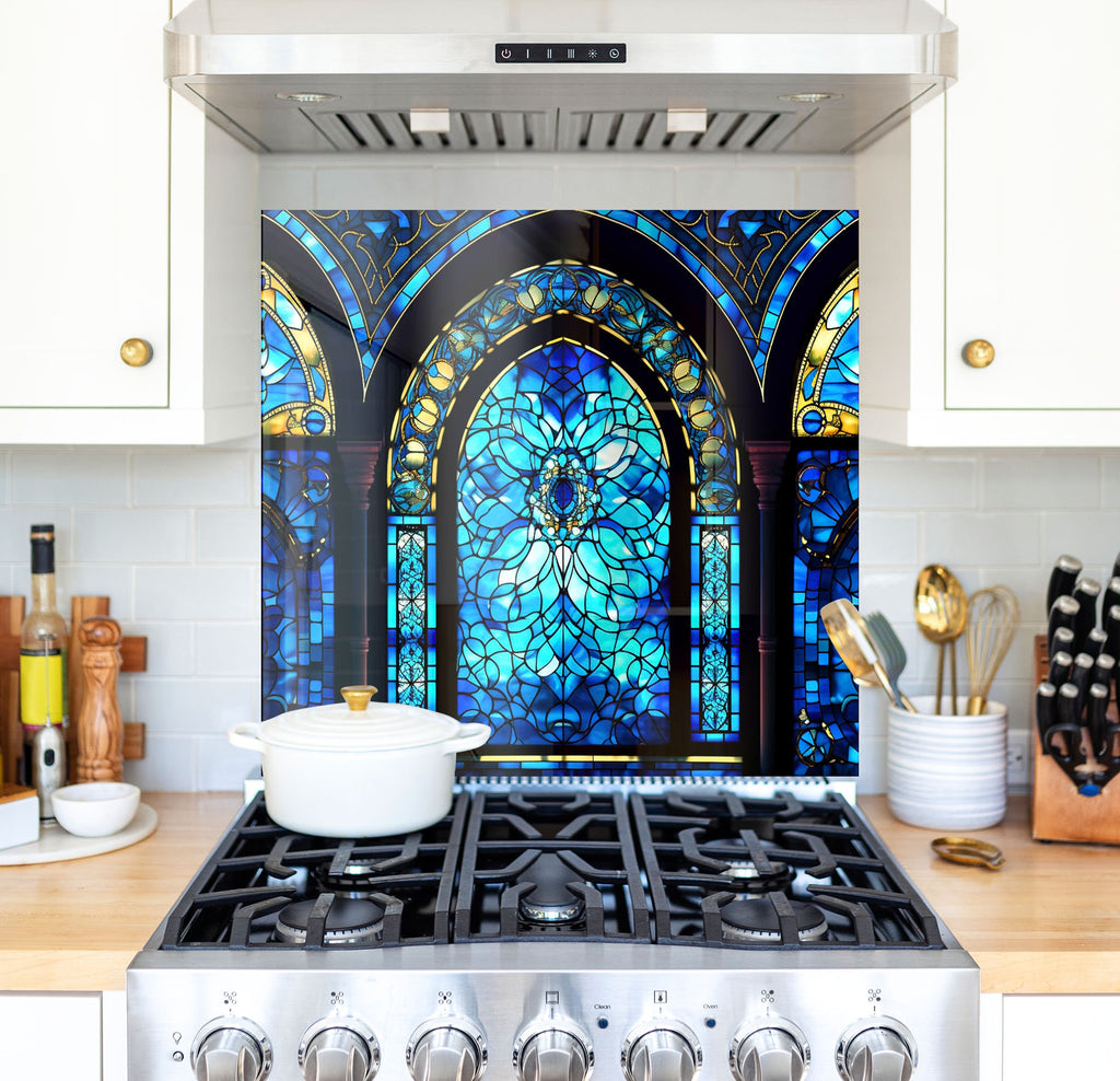 a stove top oven sitting under a stained glass window