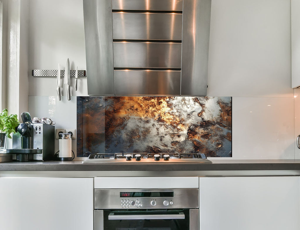 a stove top oven sitting inside of a kitchen